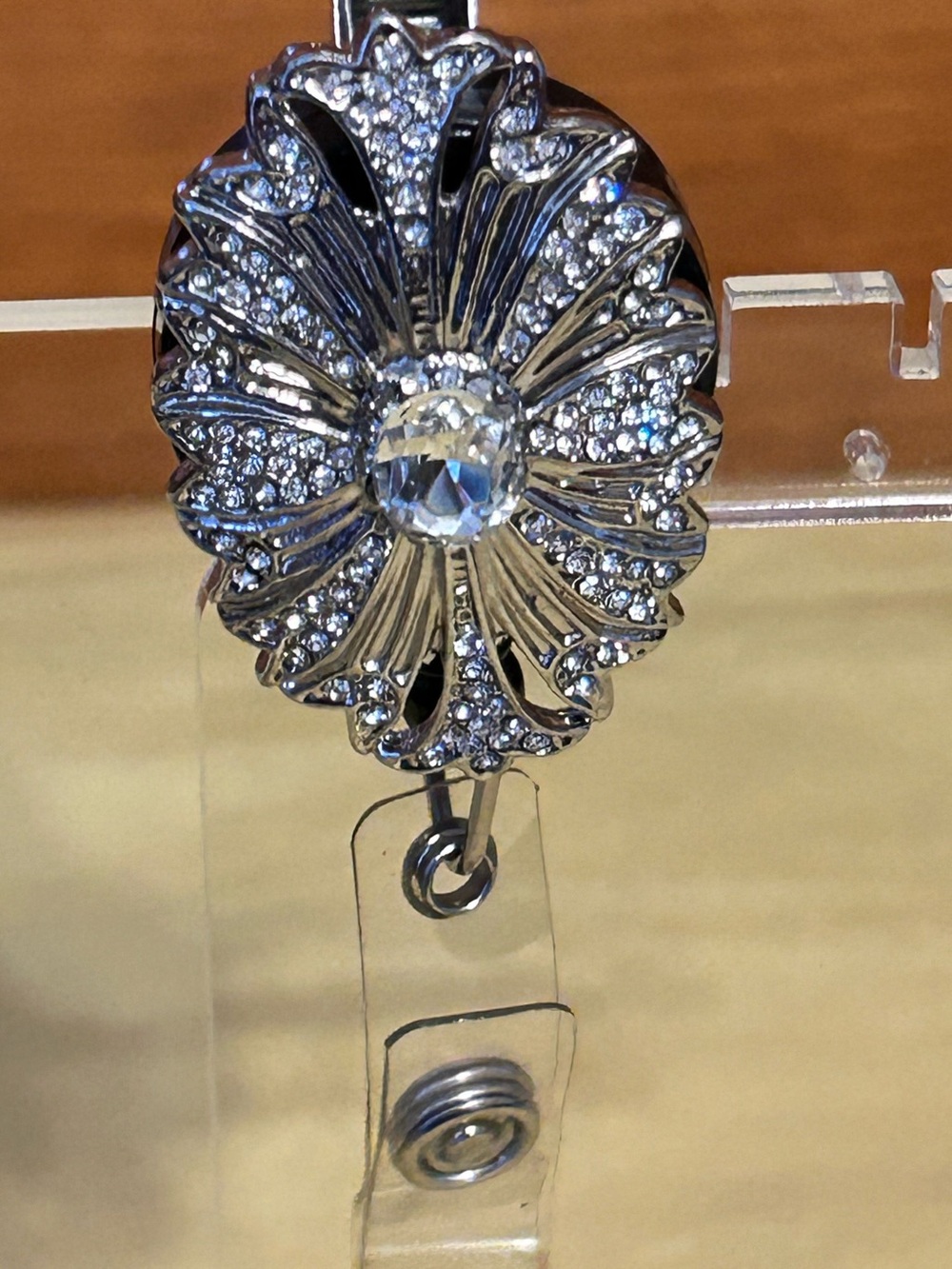Silver Crystal Floral Badge Reel - Elegant Silver Accent